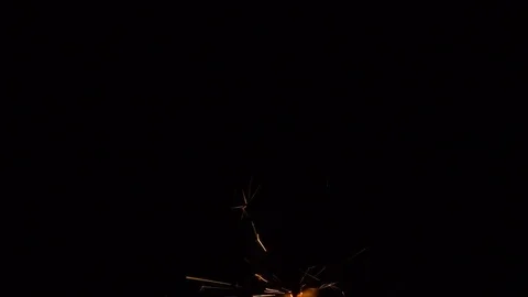 Bengal fire burns on a black background Stock Footage 84547395