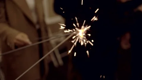 Bengal fire burns in hands. Stock Footage 164533806