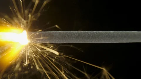 Bengal fire on the dark black background, Christmas sparkler Video stock 100608432