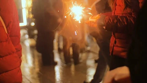 Bengal fire in the hand of a passerby. Video stock 73940156