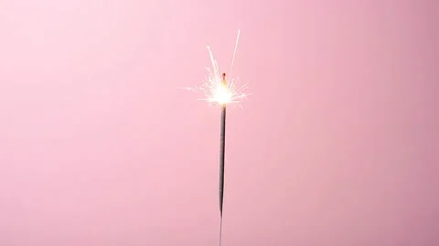 Bengal fire on an orange background close-up. Stock Footage 153968576