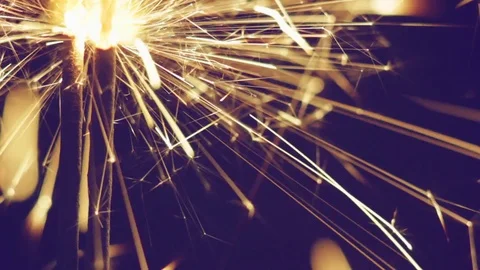 Bengal light burning with bright sparkles on black background Video stock 81511473