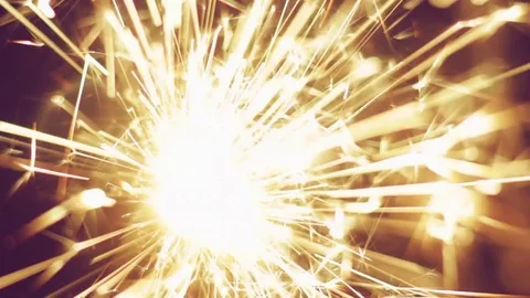 Bengal light burning with bright sparkles on black background. Top view Stock Footage 81512367