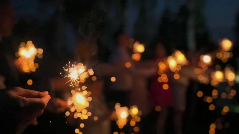 Bengal lights burning in a persons hand Video stock 328299105