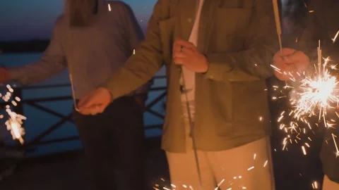 Bengal lights burning in a persons hand Stock-Footage 329092455