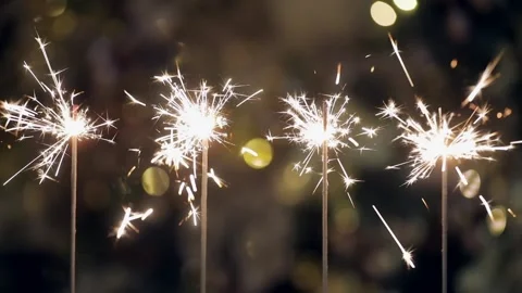 Bengali lights are sparkling in front of christmas tree. New year celebration. Stock Footage 251529456