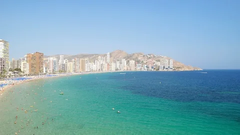 Benidorm beach and bay full of tourists, aerial skyline in the Alicante Stock Footage 89385296