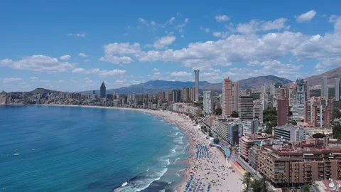 Benidorm Beach views during summer Aerial Footage Blue sky Video stock 130644284