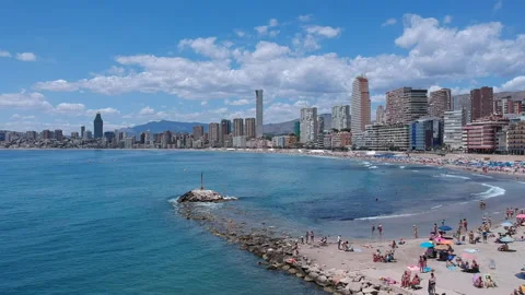 Benidorm Beach views during summer Aerial Footage Blue sky Stock Footage 130644304
