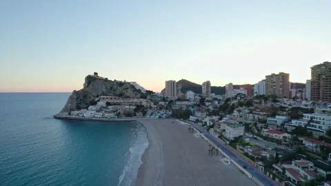 Benidorm Playa de Poniente beach at sunset during winter with tall buildings. Stock Footage 232877322