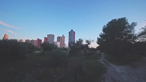 Benidorm Skyline View from a Grassy Field at Dusk Stock Footage 330132282
