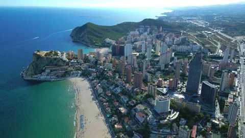 Benidorm in Spain  flight by drone over the sea beach and scyscrappers Stock Footage 214389075