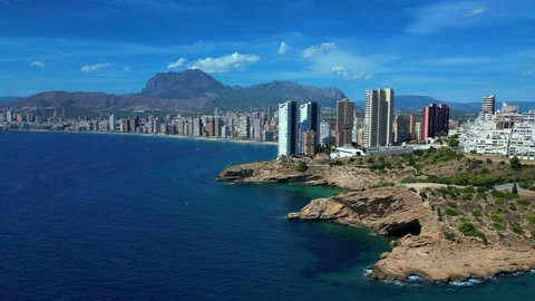 Benidorm in Spain over flight by drone  with view of the scyscrappers Stock Footage 214364729