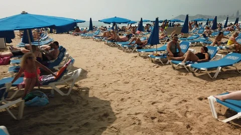 Benidorm,Spain.  15/09/2019-Tourists on the beach Stock Footage