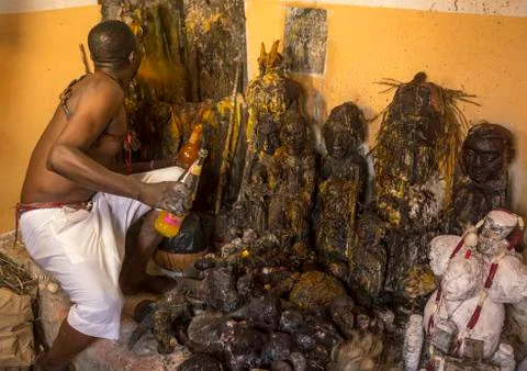 Benin, West Africa, Bonhicon, kagbanon bebe voodoo priest drinking orange juice Stock Photos