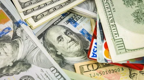 Benjamin Franklin close up rotation on surrounded by US dollars. Video stock 59138018