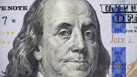 Benjamin Franklin face on new US 100 dollar bill 2013 rotating, money close up Stock Footage 99145449
