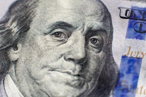 Benjamin Franklin face on us one hundred dollar bill macro isolated, united Stock Photos