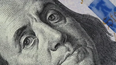 Benjamin Franklin on US 100 dollar bill slow rotating Video stock 101352072
