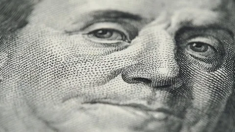 Benjamin Franklin on US 100 dollar bill extreme macro slow rotating. Low angle Stock Footage 102061015