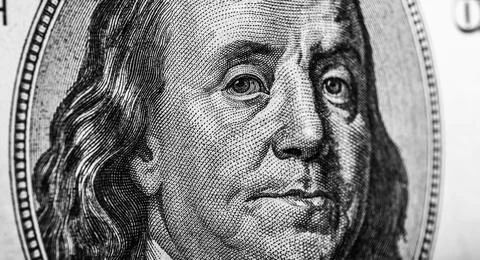 Benjamin Franklin's head on dollar Stock Photos