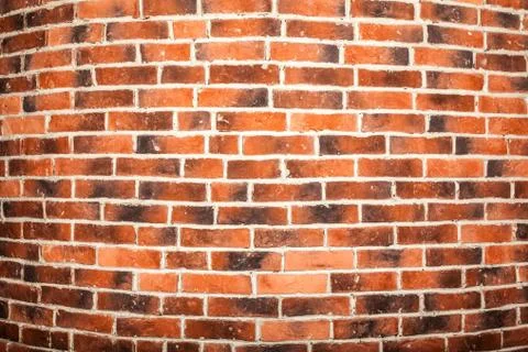 Bent brick wall. Background Stock Photos