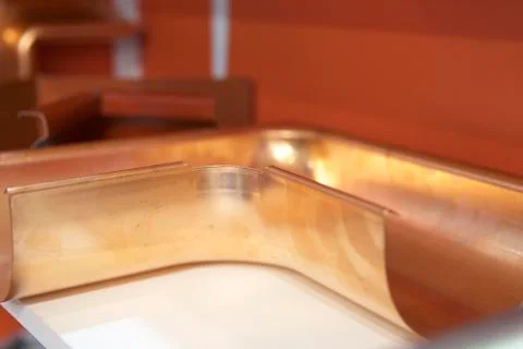 Bent copper profile for drainage system Stock-Fotos
