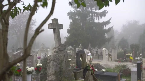 Bent cross at the cemetery 4K Stock Footage 56532185