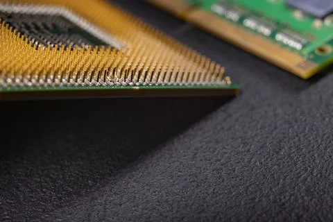 Bent leg of a computer processor. Defective spare parts for repairing electro 写真素材