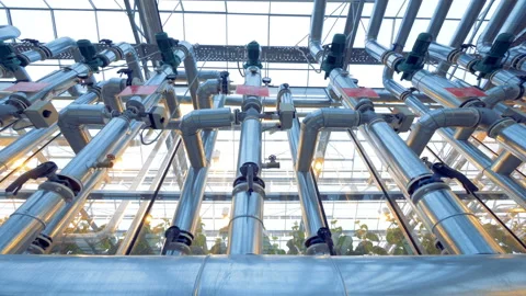 Bent lines of functioning greenhouse pipes Video stock 90952902