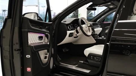 Bentley Bentayga drivers opened door. Car interior Stock Footage 136903451