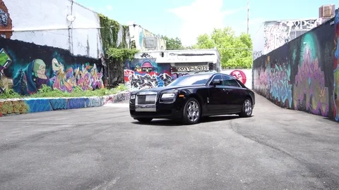 Bentley Rolls Royce Phantom with Graffiti Stock Footage 78046680