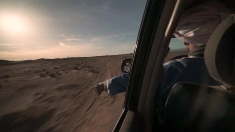 A berber drives while moves his hand off the car, freedom Stock Footage 243574165