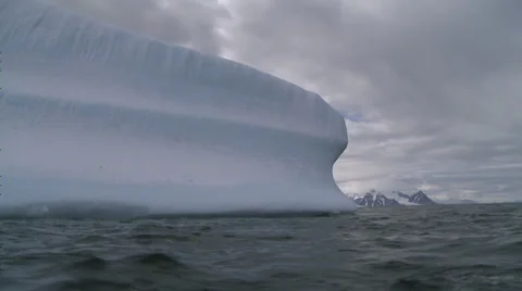 Berg under threatening sky, Antarctica Stock Footage 34312450