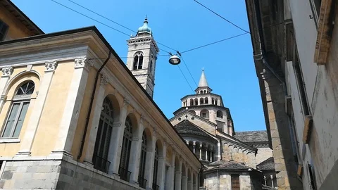 Bergamo, Old City. Bottom view on the Clock Tower of Santa Maria Maggiore Church Stock Footage