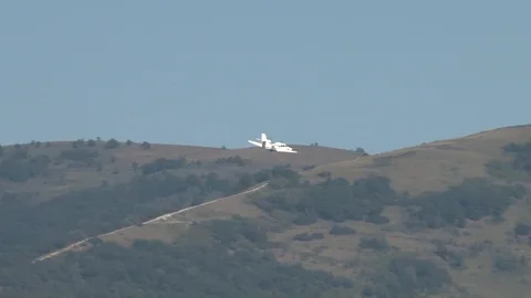 Beriev Be-103 light amphibious aircraftt performs horizontal flight. Stock Footage 120777318