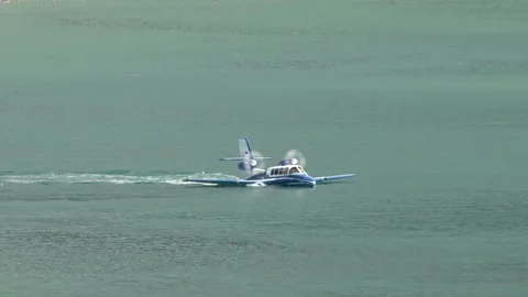 Beriev Be-103 - light amphibious aircraft (flying boat) moves to parking lot. Stock Footage 132106882