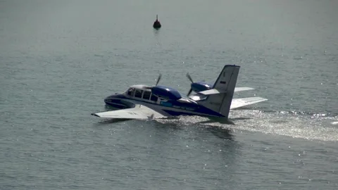 Beriev Be-103 - light amphibious aircraft (flying boat) floats on sea like boat. Stock Footage 134062854