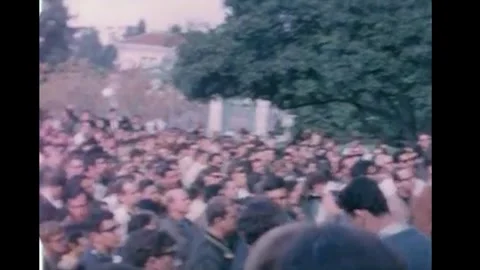 BERKELEY - 1964 - Cameramen gather around a student leader being interviewed by Stock Footage 340651027
