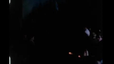 BERKELEY - 1964 - Free Speech Movement protesters gather inside a dimly lit room Vidéo 340651029