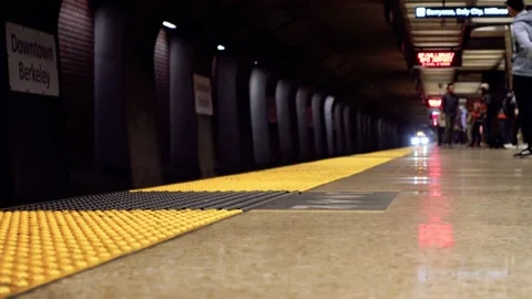 Berkeley Bart Training pulling into a station Stock Footage 203982144