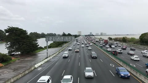 Berkeley Eastshore Freeway traffic on a cloudy day with bay views Stock Footage 336249670