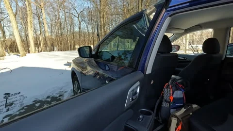 Berkeley Heights, NJ, USA - 02-15-2022: going to the car on sunny snowy day 스톡 동영상 343454270