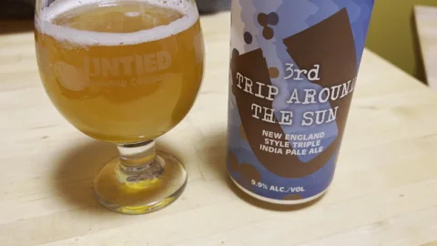 Berkeley Heights, NJ, USA - 02-12-2022: triple IPA can and glass Stock Footage 344814797