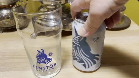 Berkeley Heights, NJ, USA - 02-06-2022: Icelandic white ale can and glass Stock Footage 344814825