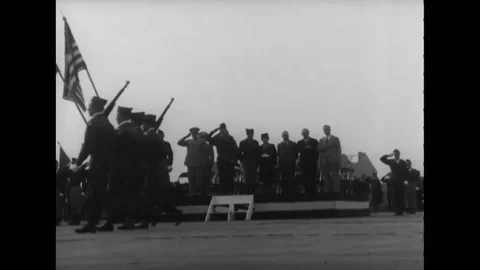 BERLIN - 1945 - Troops march on foot in formation and ride in jeeps on a runway Stock Footage 264753052