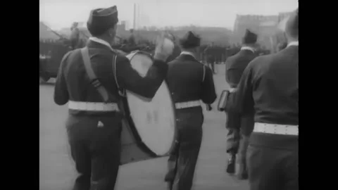 BERLIN - 1945 - Troops march on foot in formation, a military band marches and Stock Footage 264753152