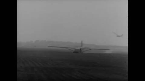 BERLIN - 1945 - Two gliders land on an airstrip, and General Dwight Eisenhower Stock Footage 264753086