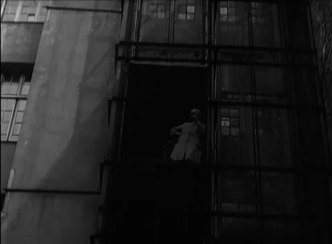 BERLIN - 1946: Staff - Workers stand at warehouse loading hatches Stock Footage 344495847