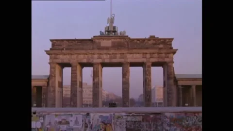 BERLIN - 1989 - Soldiers guard checkpoints by the Berlin Wall in Germany. Stock Footage 254155363